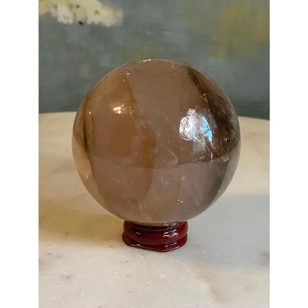Large hematoid fire quartz sphere